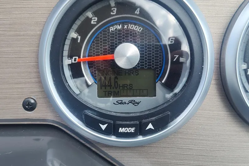 Slide: The Image of Close-up of Sea Ray Sundancer 310 tachometer showing 144.6 engine hours. - 21