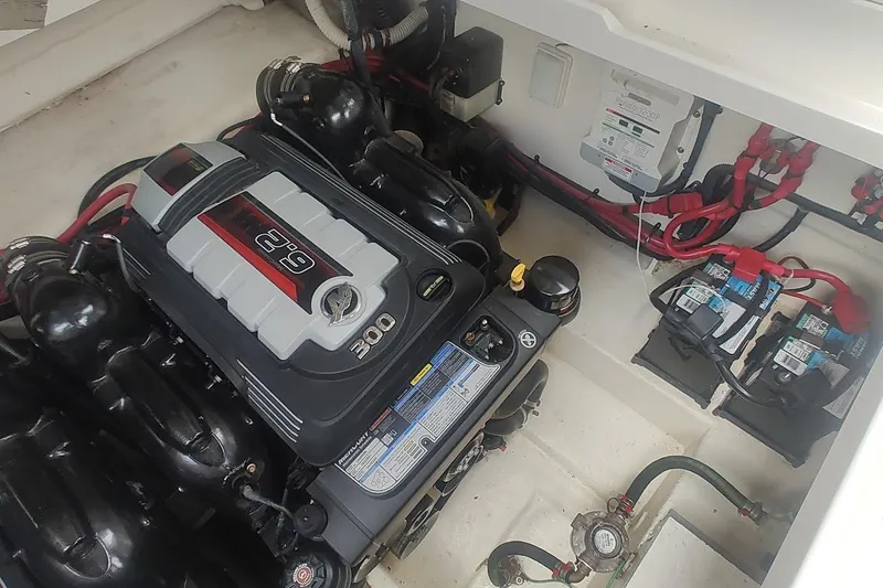 Slide: The Image of Engine compartment of 2017 Sea Ray Sundancer 310 with visible MerCruiser 6.2L engine. - 39