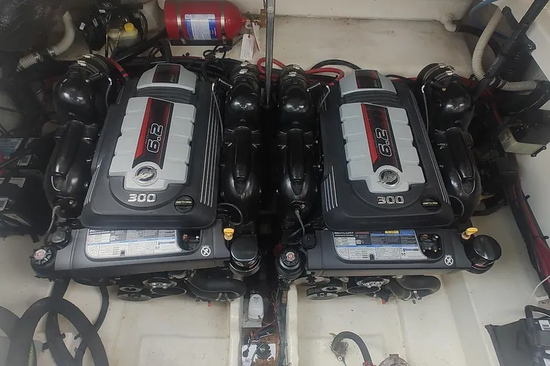 Slide: The Image of Twin 6.2L engines in 2017 Sea Ray Sundancer 310 boat engine compartment. - 40