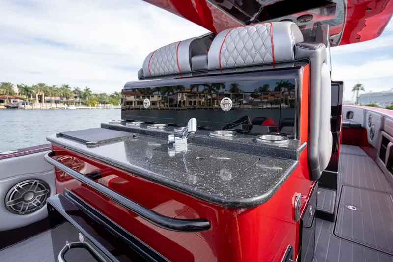 Slide: The Image of Luxurious 2022 Concept 39' Open boat interior with sleek red and black design. - 10