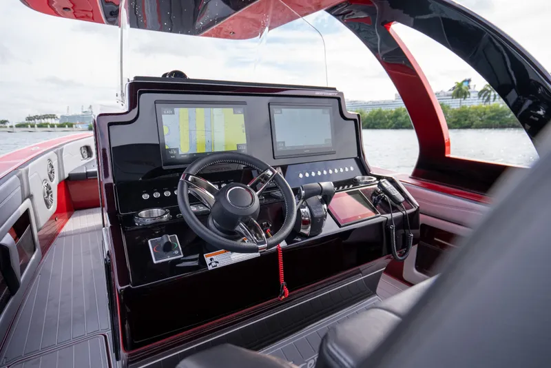 Slide: The Image of 2022 Concept 39' Open boat cockpit with modern navigation displays and steering wheel. - 5