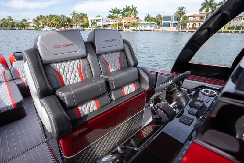 Slide: The Image of Luxury seating and helm of 2022 Concept 39' Open boat, featuring modern design and controls. - 6