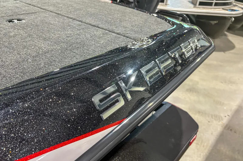 Slide: The Image of 2026 Skeeter ZXR19 boat with sleek design and metallic finish. - 8