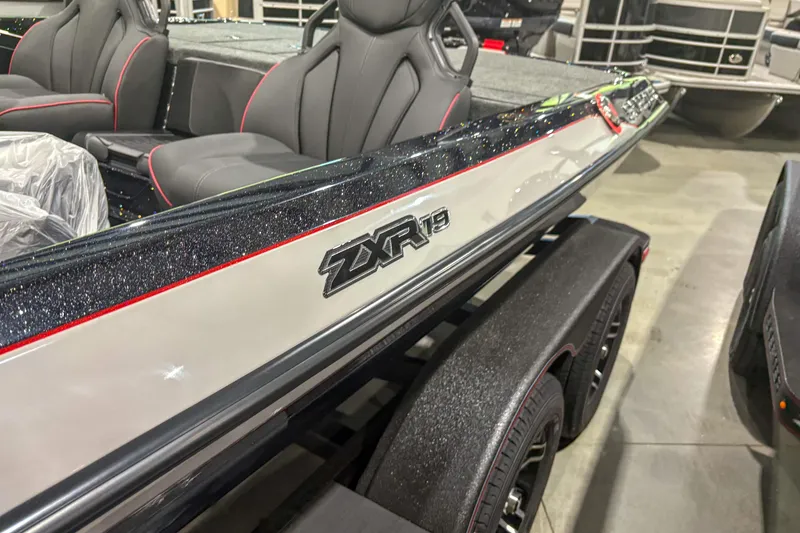 Slide: The Image of 2026 Skeeter ZXR19 boat with sleek design and comfortable seating. - 9