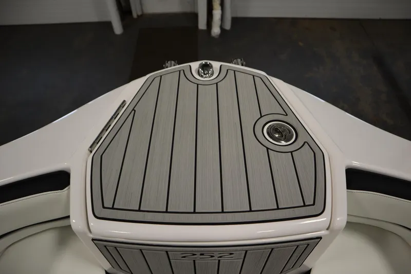 Slide: The Image of 2025 Yamaha Boats 252S bow with sleek, modern deck design and integrated features. - 11