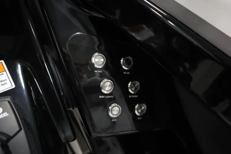 Slide: The Image of Control panel of 2025 Yamaha Boats 252S with labeled buttons for various functions. - 22