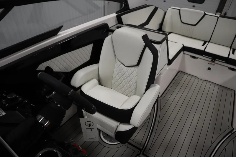 Slide: The Image of 2025 Yamaha Boats 252S interior with luxurious white seating and modern design. - 27