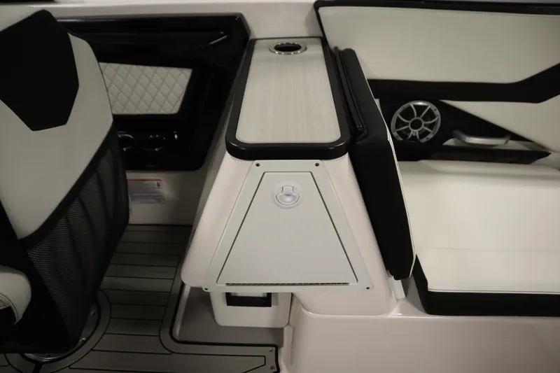 Slide: The Image of 2025 Yamaha Boats 252S interior, featuring sleek seating and modern design elements. - 36