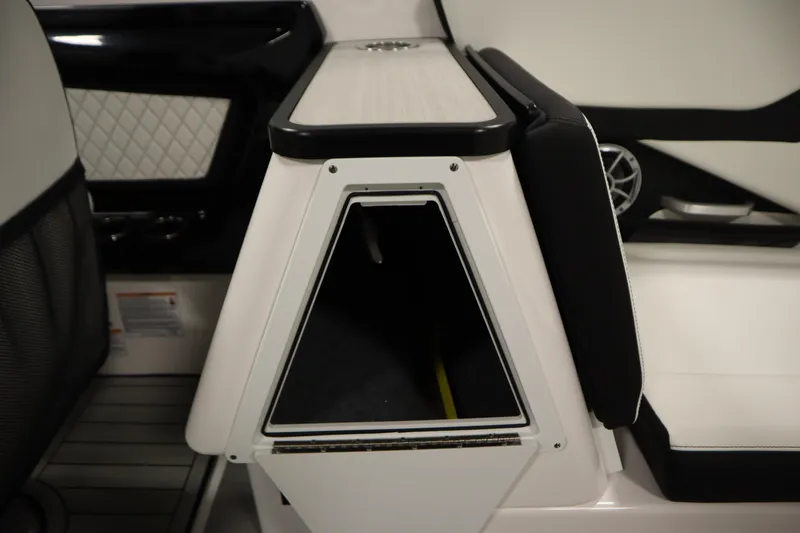 Slide: The Image of Interior view of 2025 Yamaha Boats 252S, featuring sleek storage compartment and modern design. - 37