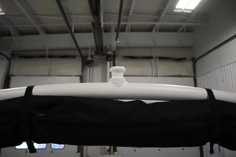 Slide: The Image of 2025 Yamaha Boats 252S interior detail in a garage setting. - 39