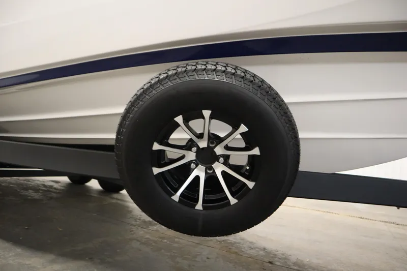 Slide: The Image of Trailer wheel of 2025 Yamaha Boats 252S, showcasing sleek design and durable construction. - 45