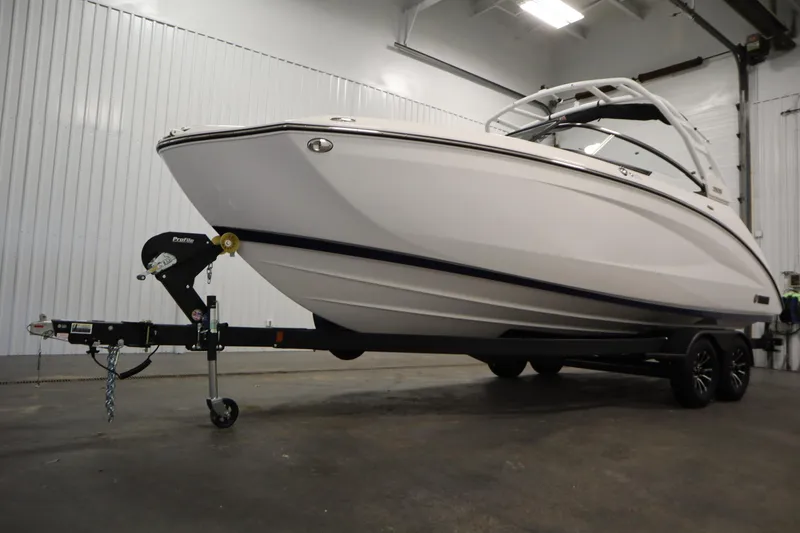 Slide: The Image of 2025 Yamaha Boats 252S on trailer in indoor storage facility. - 46