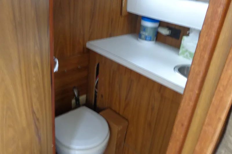 Slide: The Image of Compact wooden bathroom interior in a 1976 Tolly sedan. - 15