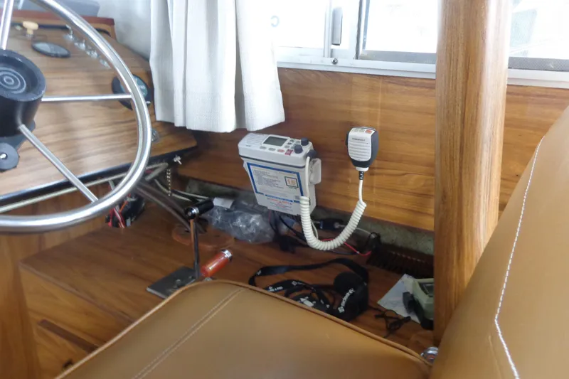 Slide: The Image of Interior of a 1976 Tolly sedan with vintage steering and radio equipment. - 23