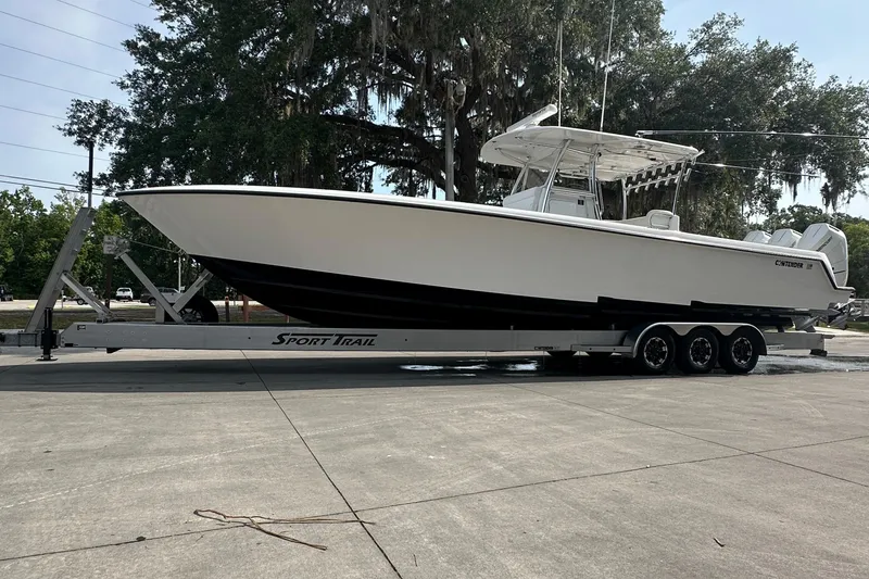 Slide: The Image of 2024 Contender 39 ST boat interior with sleek seating and modern design. - 18