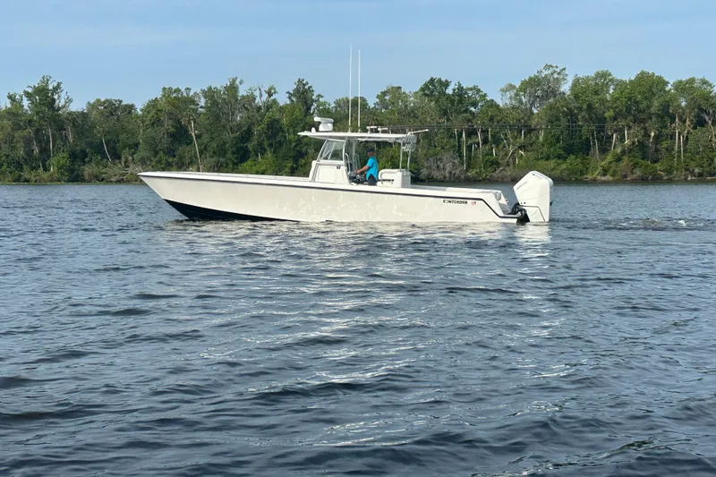 Slide: The Image of 2024 Contender 39 ST boat interior with speakers and deck design. - 6