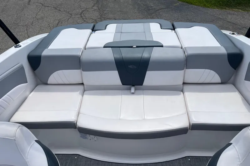 Slide: The Image of 2021 Chaparral 21 SSi boat interior with gray and white seating. - 5