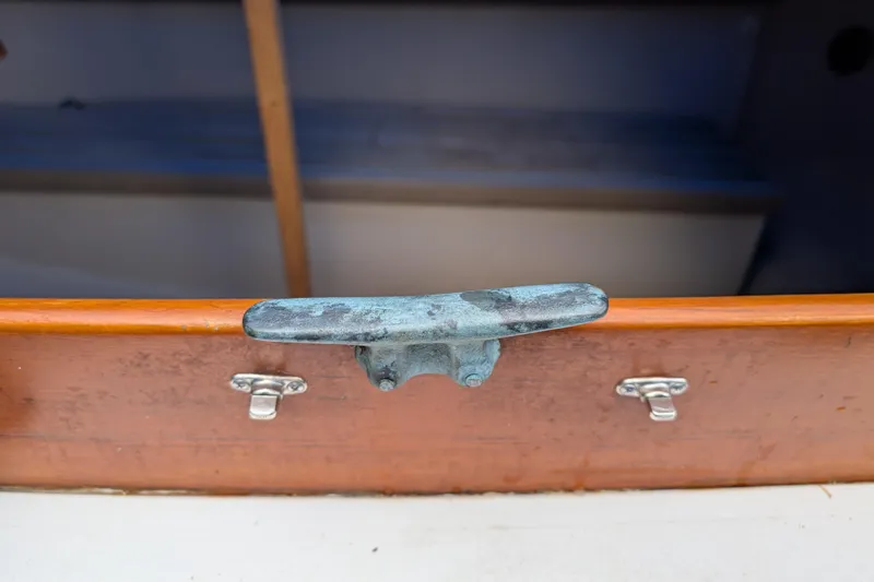 Slide: The Image of 1981 Cape Dory Typhoon boat cleat and hardware detail. - 7