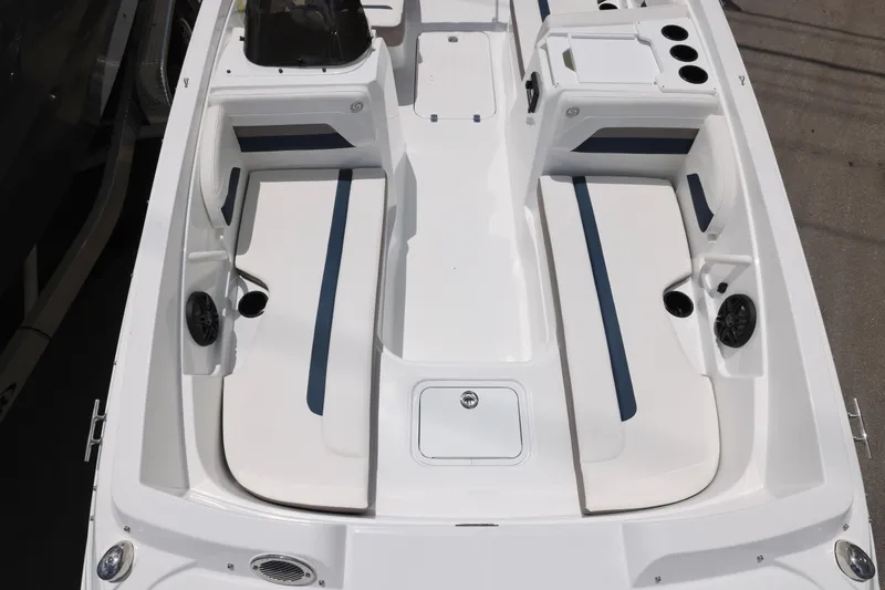 Slide: The Image of 2026 Hurricane SunDeck Sport 205 OB boat interior with seating and steering console. - 14