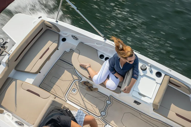 Slide: The Image of 2025 Hurricane SunDeck Sport 205 OB boat cruising on water, aerial view. - 25