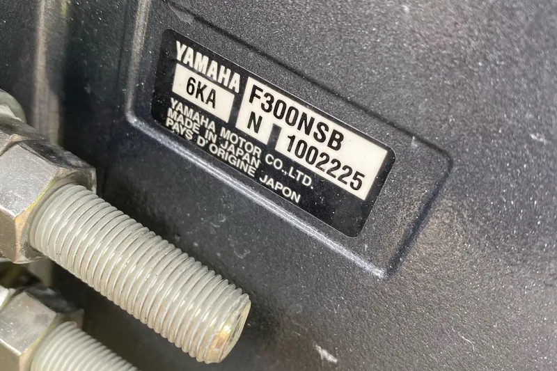 Slide: The Image of Yamaha motor label on 2022 Cobia 240 Dual Console boat engine. - 18