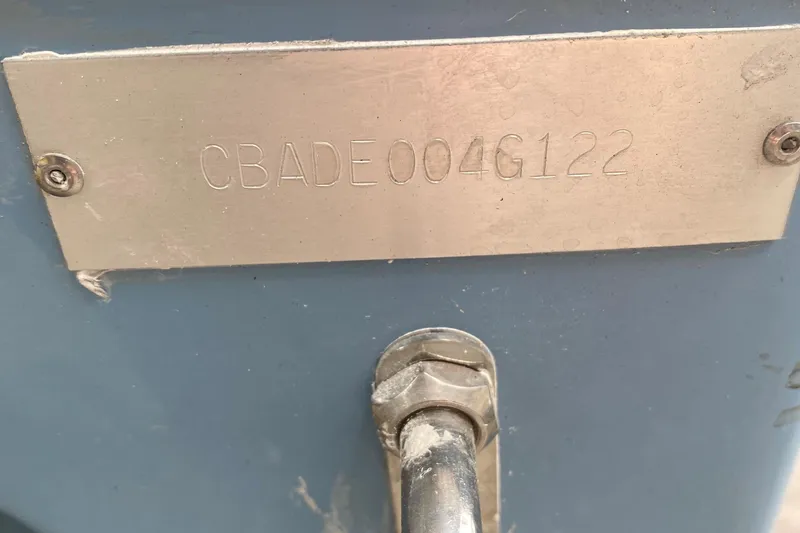 Slide: The Image of 2022 Cobia 240 Dual Console boat identification plate with serial number. - 19