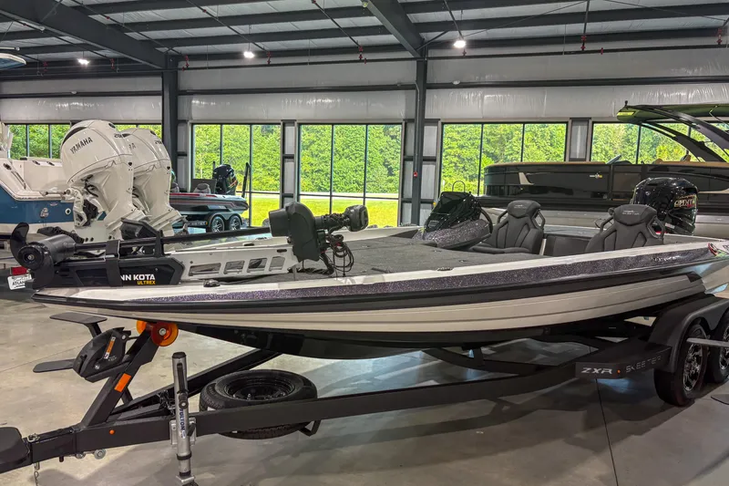 The Image of 2020 Skeeter ZXR20 SE bass boat in showroom, featuring Minn Kota Ultrex trolling motor. - 1