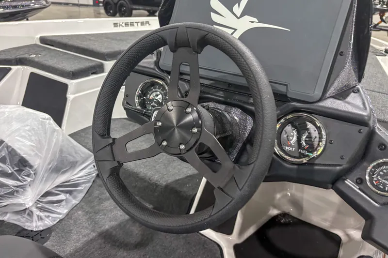 Slide: The Image of 2020 Skeeter ZXR20 SE boat dashboard with steering wheel and gauges. - 10