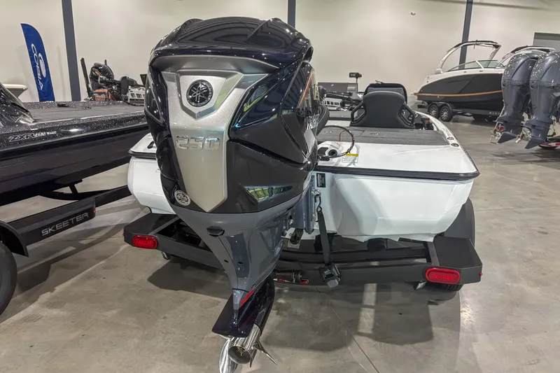 Slide: The Image of 2020 Skeeter ZXR20 SE boat with powerful 250 horsepower outboard motor in showroom. - 9