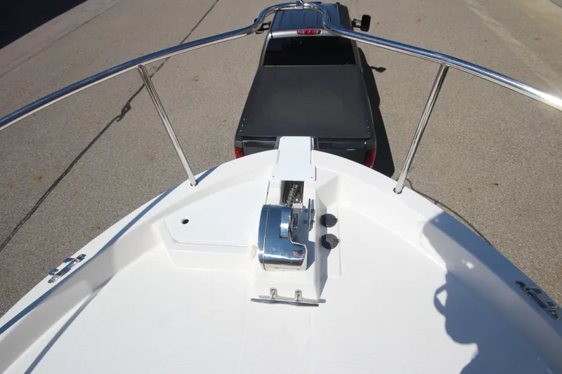 Slide: The Image of 2020 Ranger Tugs R-31 Command Bridge LE on trailer, viewed from bow. - 51