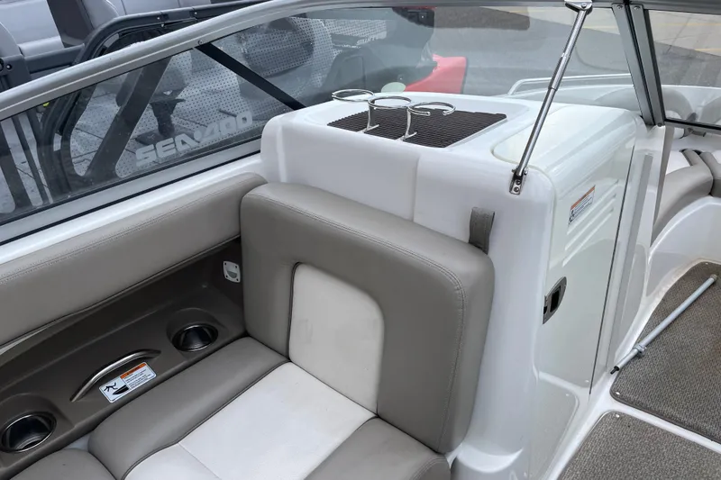Slide: The Image of 2009 Yamaha Boats 232 Limited S interior with seating and cup holders. - 16