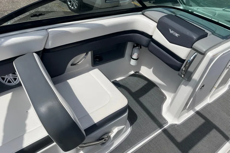 Slide: The Image of Interior of 2015 Chaparral Vortex 223 VRX boat with seating and storage. - 15