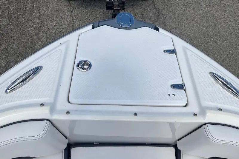 Slide: The Image of 2015 Chaparral Vortex 223 VRX boat bow with storage hatch and sleek design. - 3