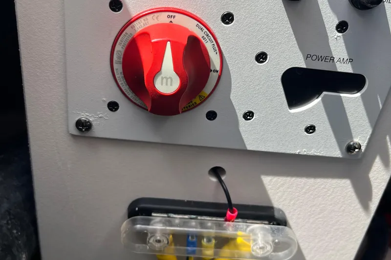 Slide: The Image of Control panel of a 2015 Chaparral Vortex 223 VRX boat with red power switch. - 5