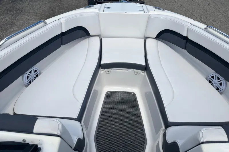 Slide: The Image of 2015 Chaparral Vortex 223 VRX boat interior with white and gray seating. - 7