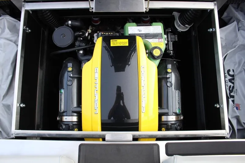 Slide: The Image of 2026 Centurion Ri 230 engine compartment with yellow and black cover. - 9