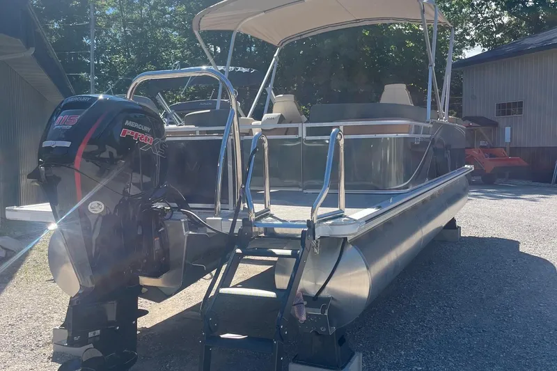 Slide: The Image of 2026 Avalon 23 LSZ Quad Lounger pontoon boat with Mercury 115 Pro XS engine. - 9