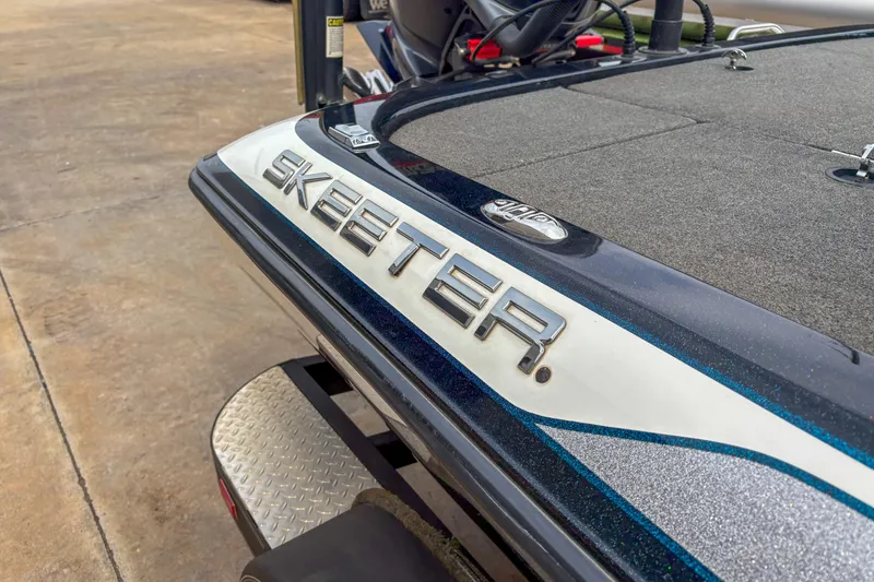 Slide: The Image of 2016 Skeeter ZX200 boat rear view with logo and deck details. - 10