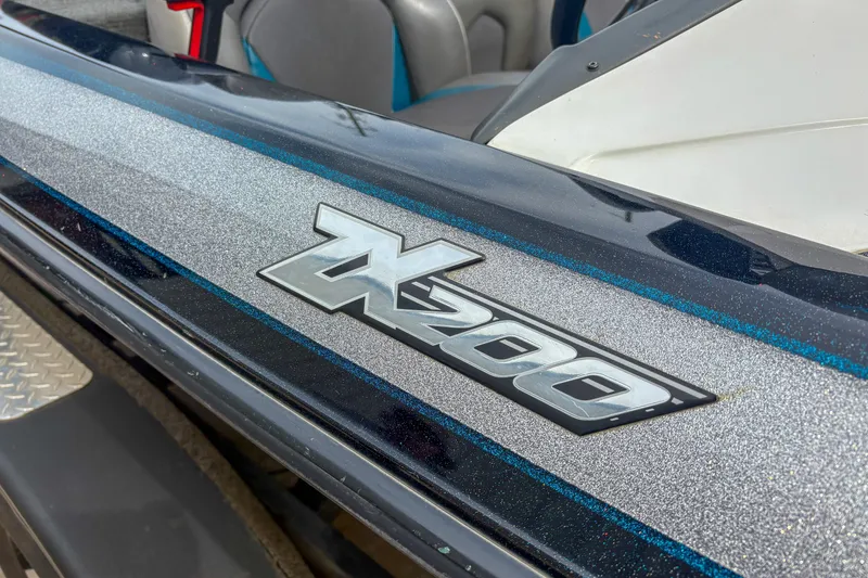 Slide: The Image of 2016 Skeeter ZX200 boat with metallic finish and model emblem. - 9