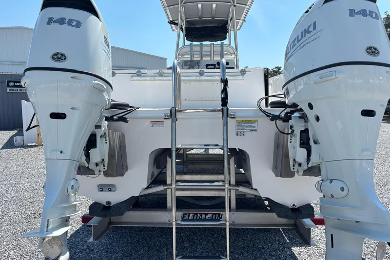 Slide: The Image of 2022 Twin Vee 240 GFX CC boat with dual Suzuki 140 outboard motors. - 9
