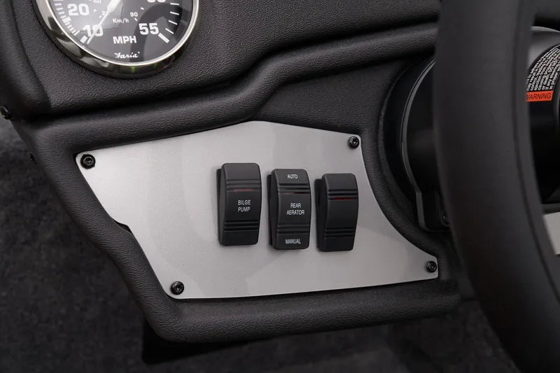 Slide: The Image of Manufacturer Provided Image: Control panel of 2025 Ranger RT178 boat with switches and speedometer. - 46