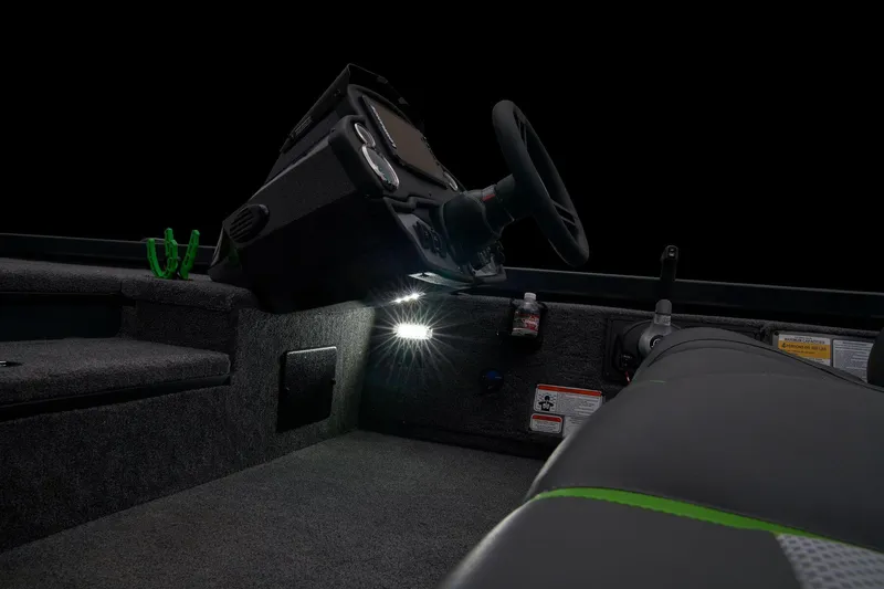 Slide: The Image of Manufacturer Provided Image: 2025 Ranger RT178 boat interior with illuminated dashboard and steering wheel. - 49
