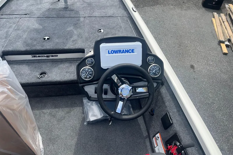 Slide: The Image of 2025 Ranger RT178 boat dashboard with Lowrance display and steering wheel. - 6