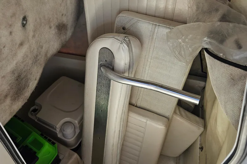 Slide: The Image of 2012 Sea Fox 226CC boat interior with cushions and storage area. - 8