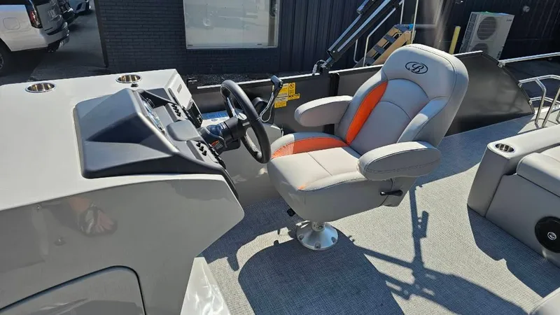 Slide: The Image of Control panel of 2025 Bentley Pontoons Legacy 243 Swingback with Simrad and JBL systems. - 8