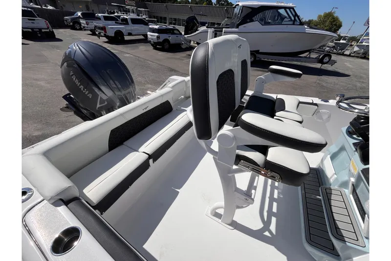 Slide: The Image of 2026 Tidewater 220 LXF boat interior with Yamaha engine and comfortable seating. - 6