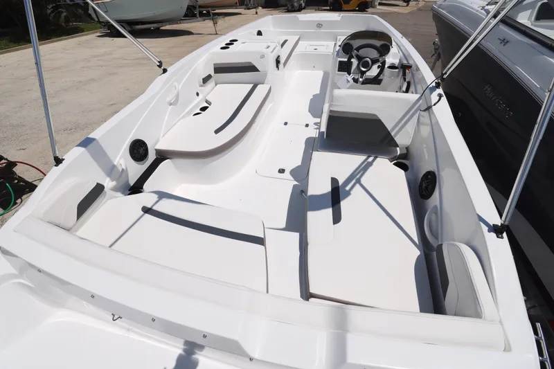 Slide: The Image of 2026 Hurricane SunDeck Sport 205 OB capacity label, max 10 persons or 1308 lbs. - 12