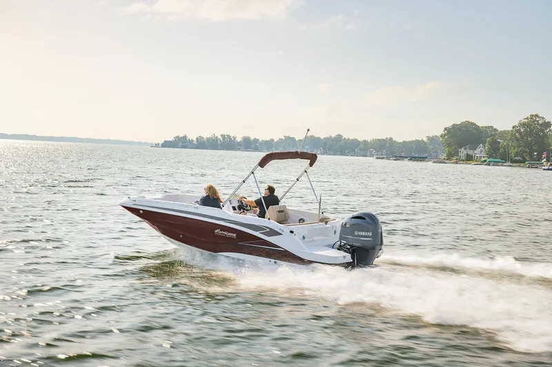 Slide: The Image of 2025 Hurricane SunDeck Sport 205 OB at dock, two people boarding. - 30