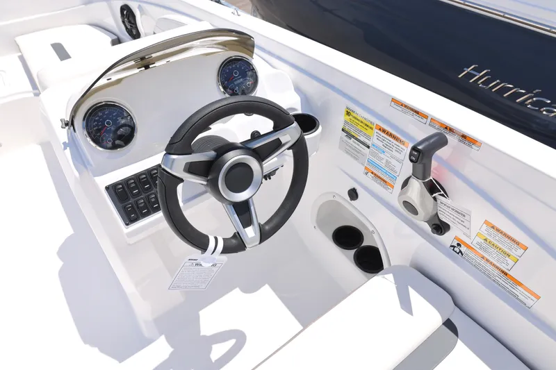 Slide: The Image of 2026 Hurricane SunDeck Sport 205 OB boat interior with spacious seating and modern design. - 5