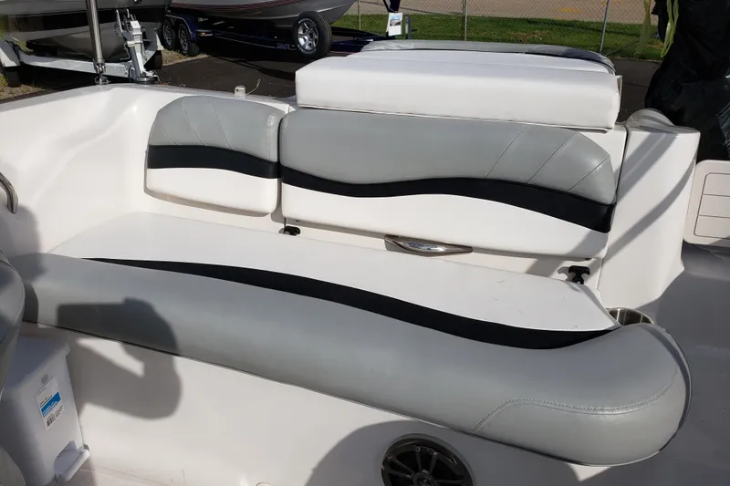 Slide: The Image of 2015 Starcraft Limited 2000 IO boat interior with gray and white seating. - 20